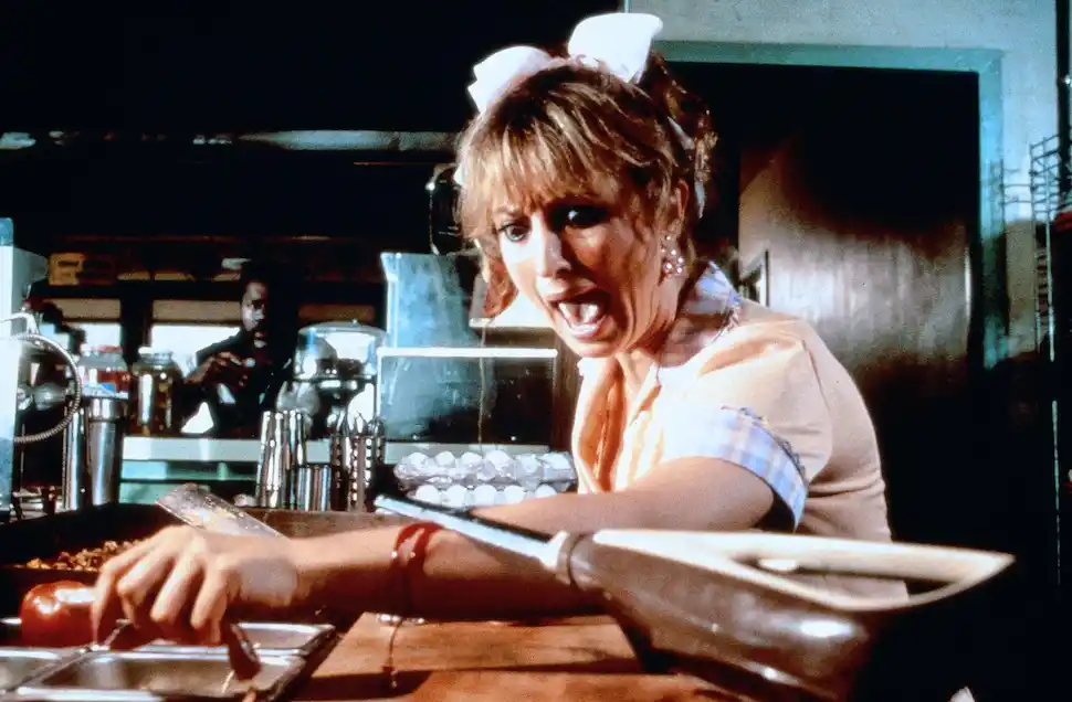 Elektrogeräte und eine Frau